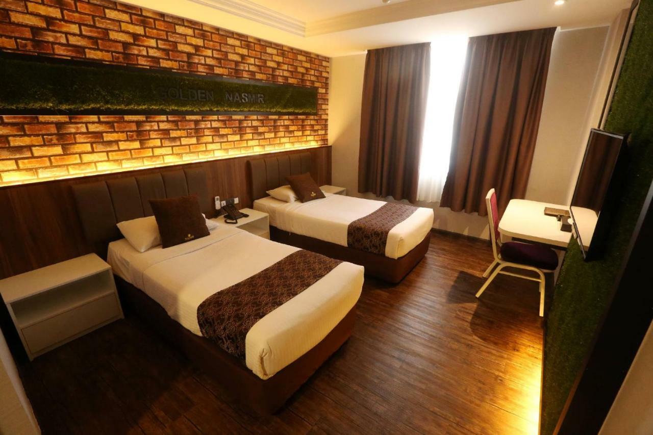 Golden Nasmir Hotel ブキッ・ムルタジャム エクステリア 写真