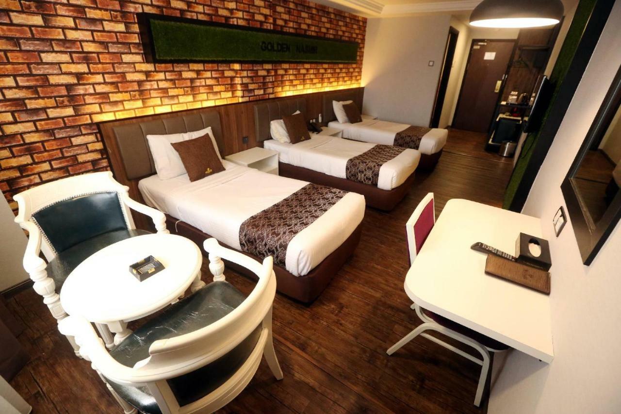 Golden Nasmir Hotel ブキッ・ムルタジャム エクステリア 写真